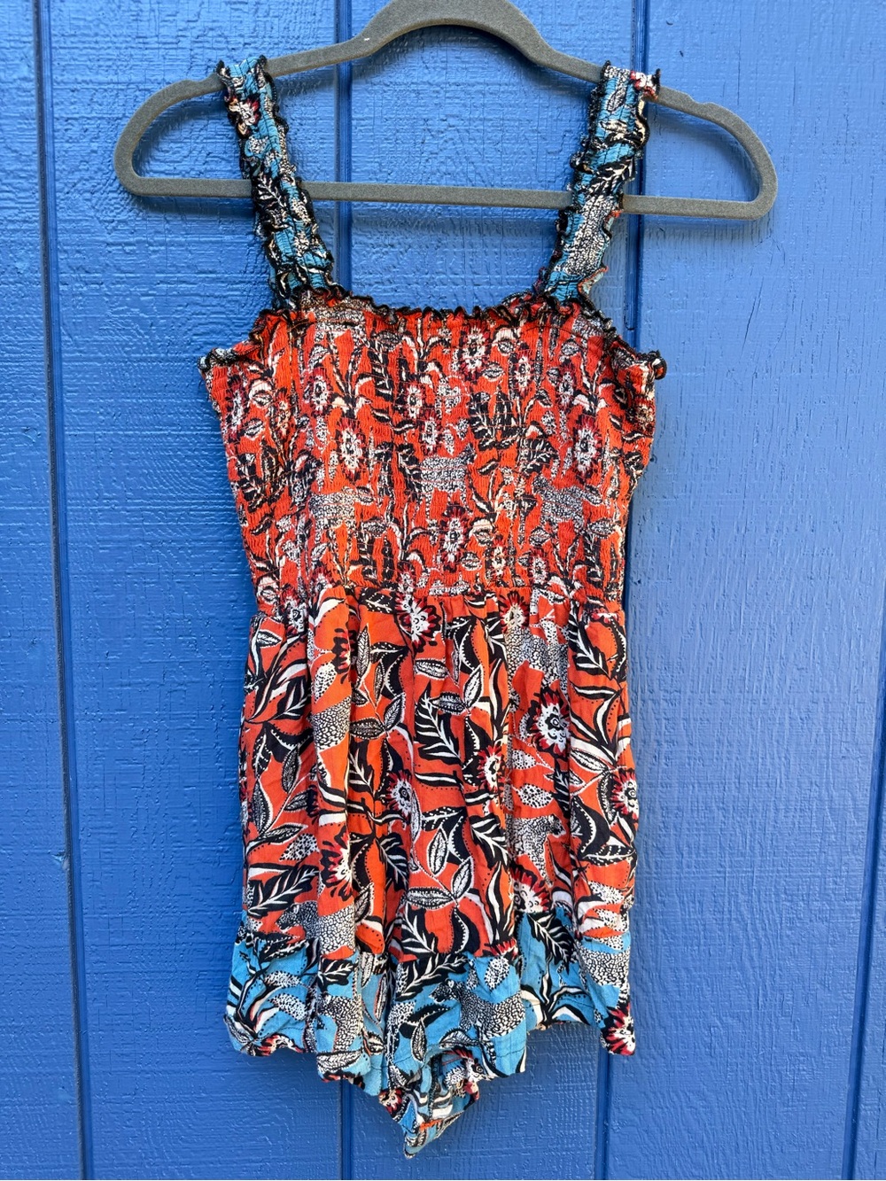 Bright Floral Smocked Romper in Red and Blue